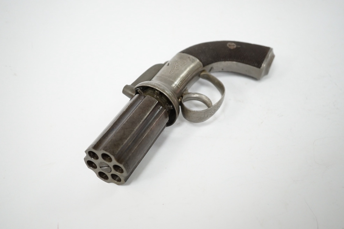 A six shot 120 bore self cocking percussion pepper box revolver, with fluted barrels, Birmingham proofed, round scroll engraved frame, and two-piece chequered walnut grips. Condition - fair to good, acid cleaned